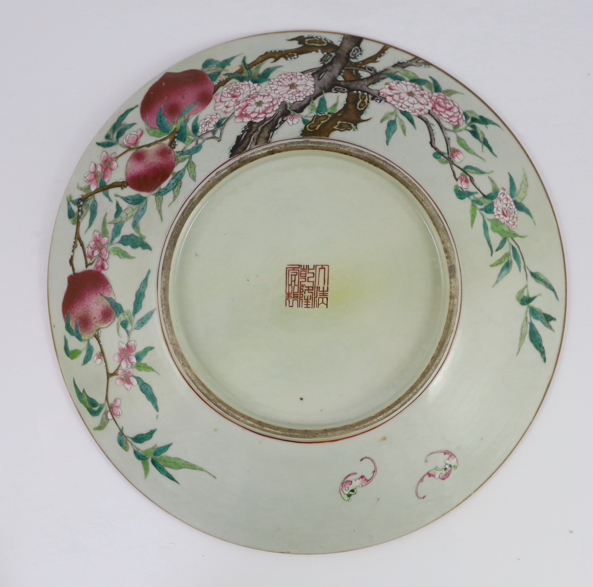 A large Chinese ‘nine peach’ enamelled porcelain dish, Qianlong seal mark but 19th century